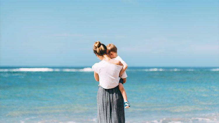 mother and son on beach