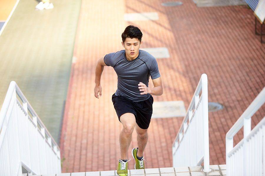 man running up stairs because exercise keeps the brain healthy